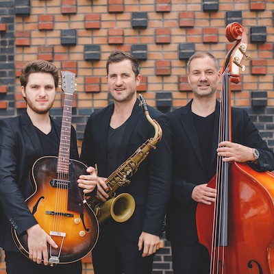 © Soul Jazzband | Musikalische Begleitung Kindertagesbetreuung Kongress 2022 Foto der drei Musiker von der Soul Jazzband